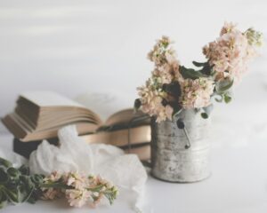 white flowers in white ceramic vase