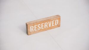 Wooden sign with the word reserved